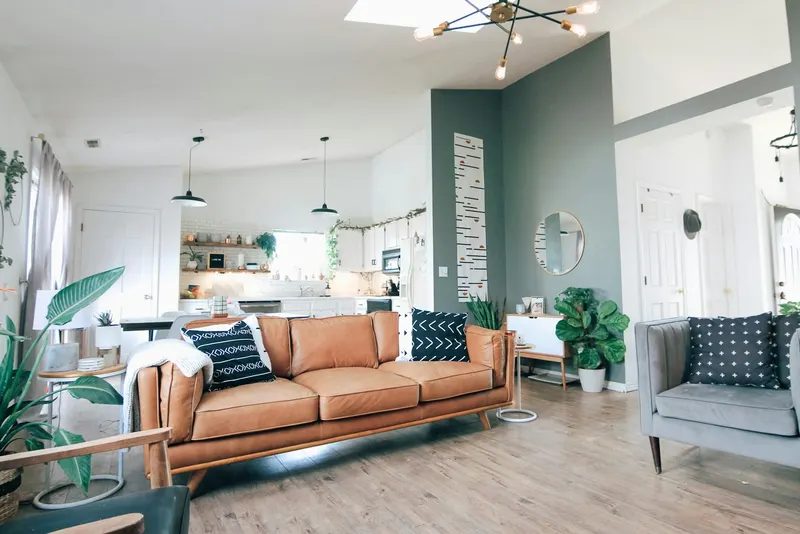 A staged living room with a leather sofa